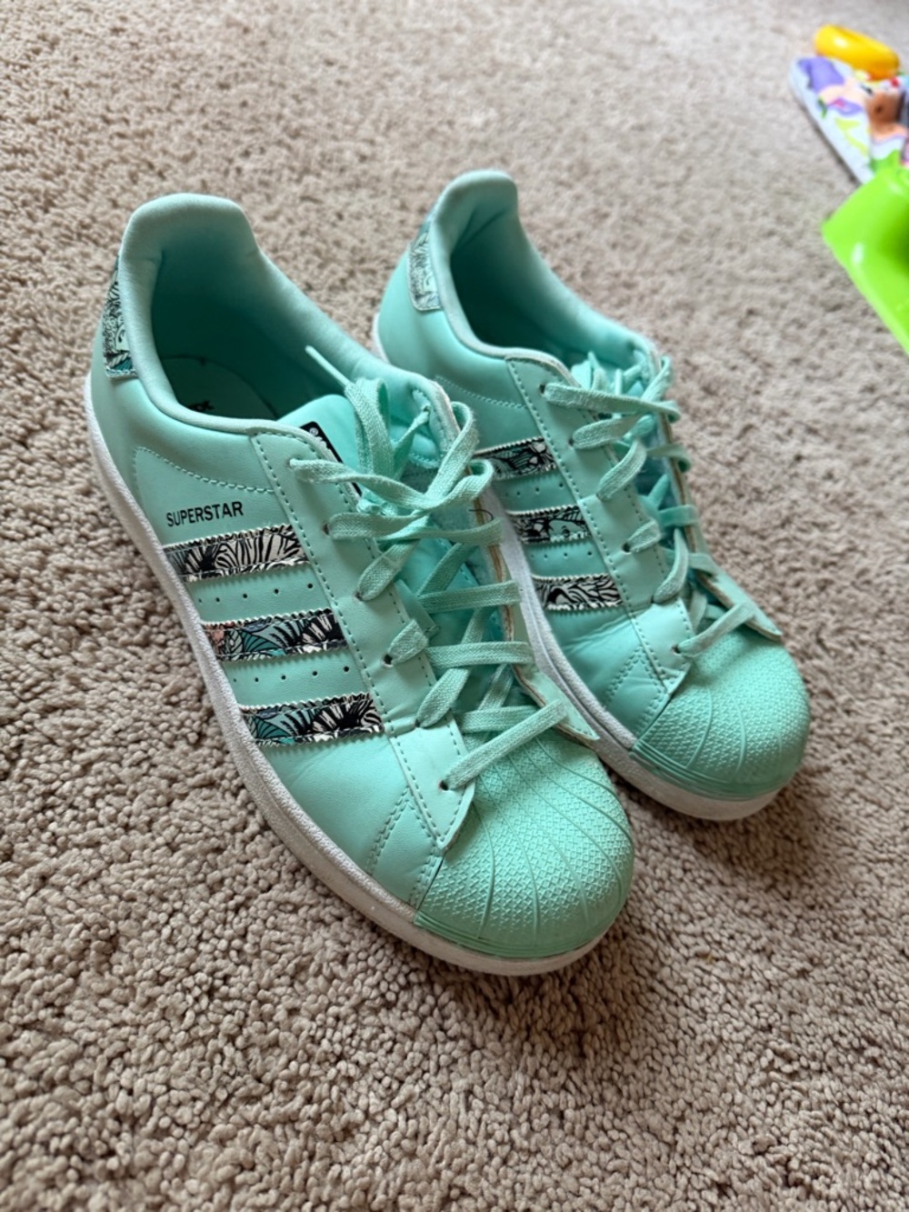 adidas Women's Mint Green Superstar Sneakers with Zebra-Print Stripes